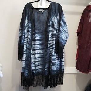 Tye dye kimono with black tassles .